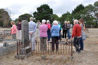 Members of the Condah community visit their local cemetery